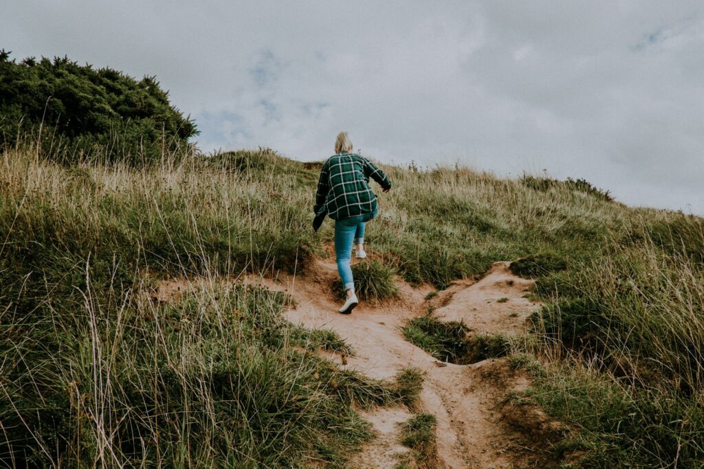 woman walking trail